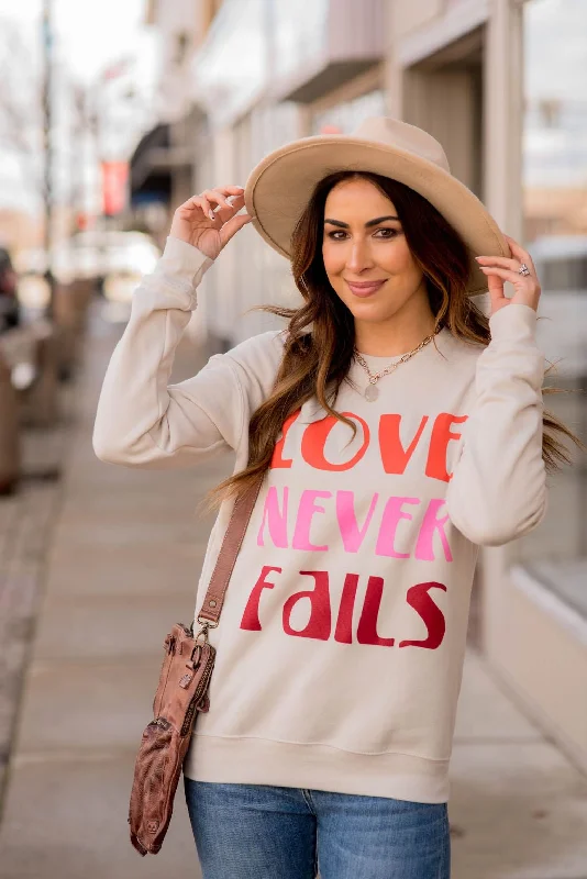 hoodie with a bold statement -Love Never Fails Graphic Crewneck